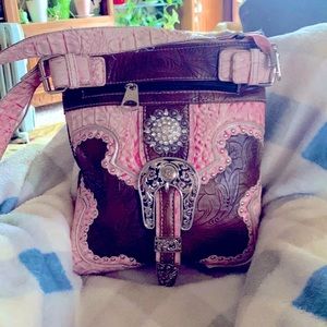 Crossbody-Concealed Weapon pocket. Used well but has many more miles to go!